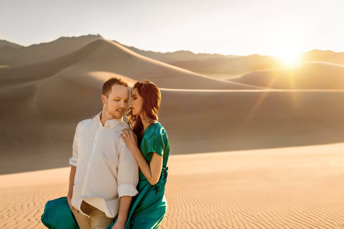 Sand dune couple engagement photo by Eden Bao
