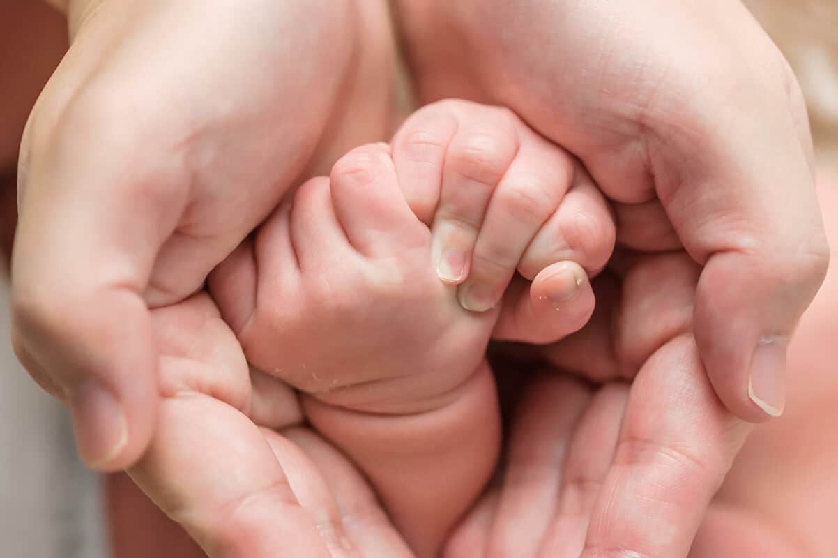 Newborn hands Eden Bao