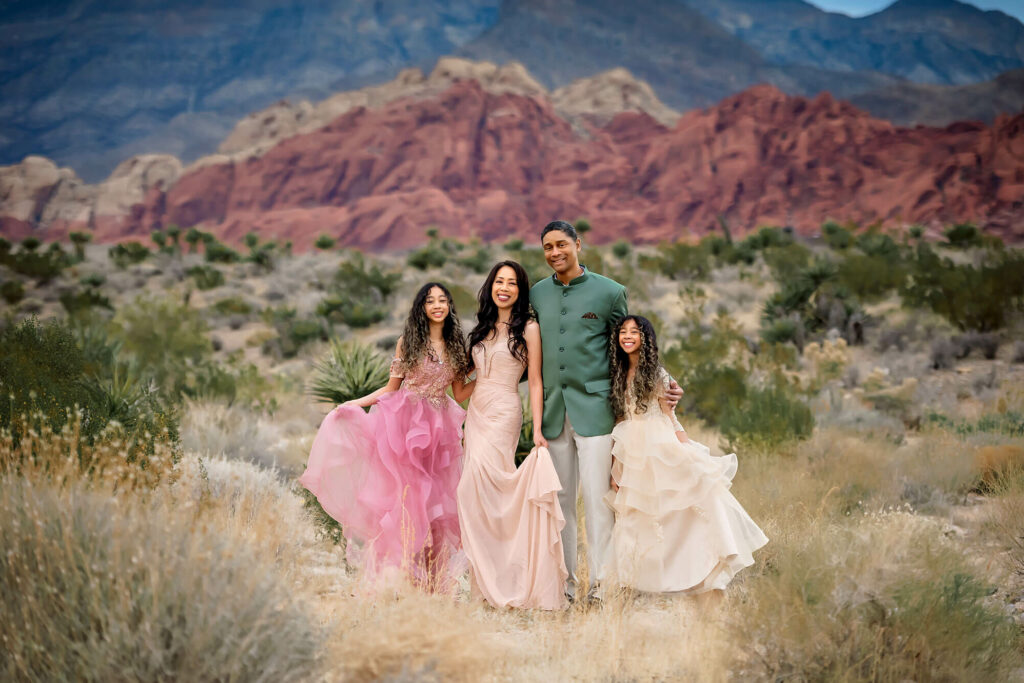Family posing in front of Red Rock Canyon for Las Vegas Family Photographer